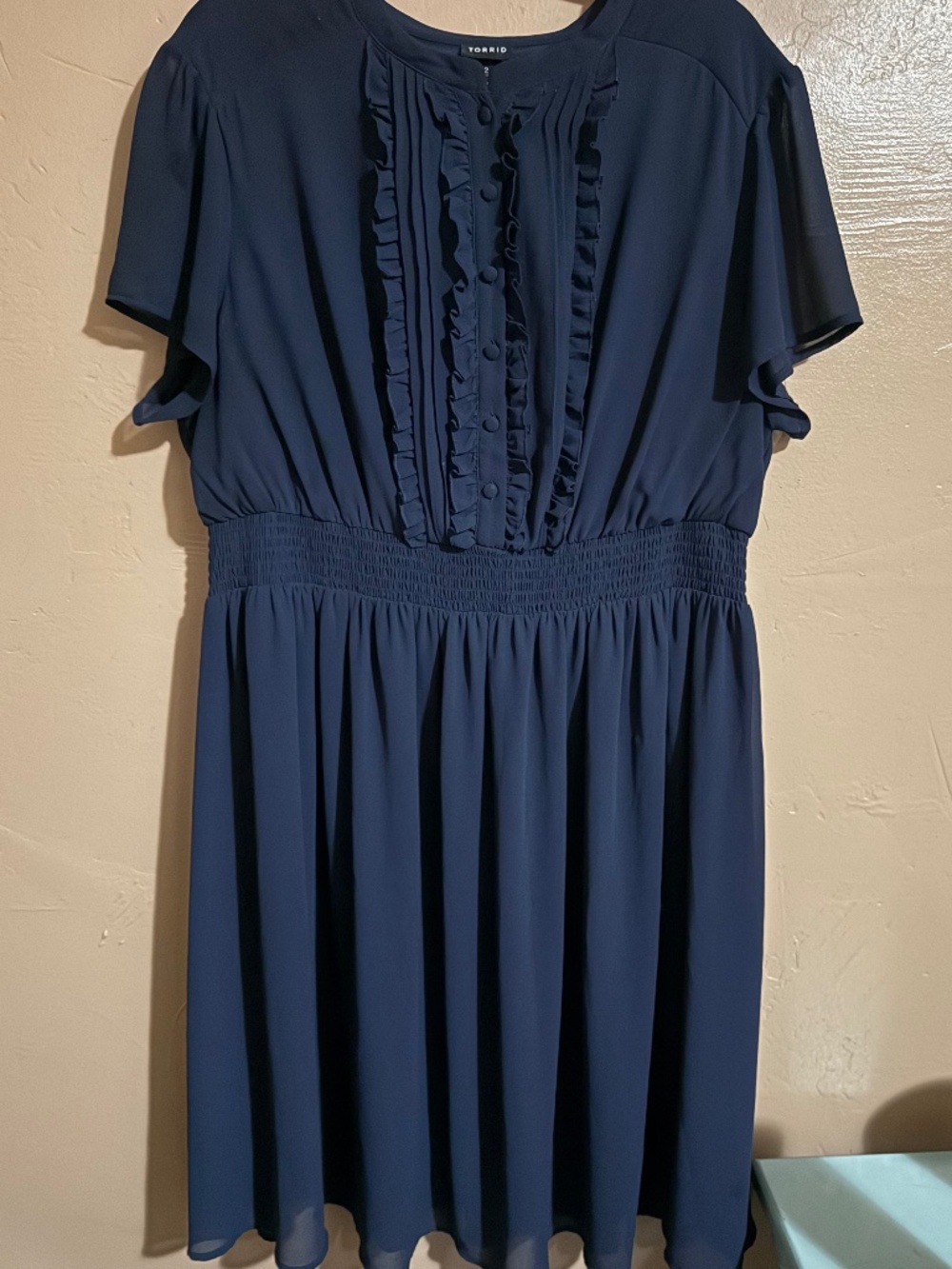 TORRID size 2 lined dress with embellished of buttons and ruffle. The excellent